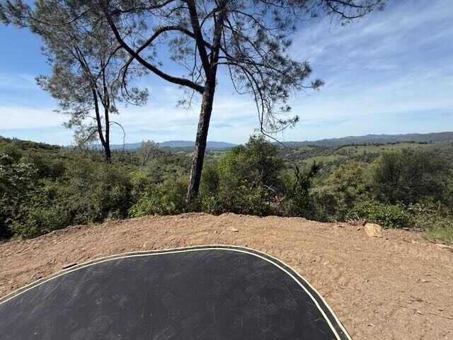 Trampoline with foothill views